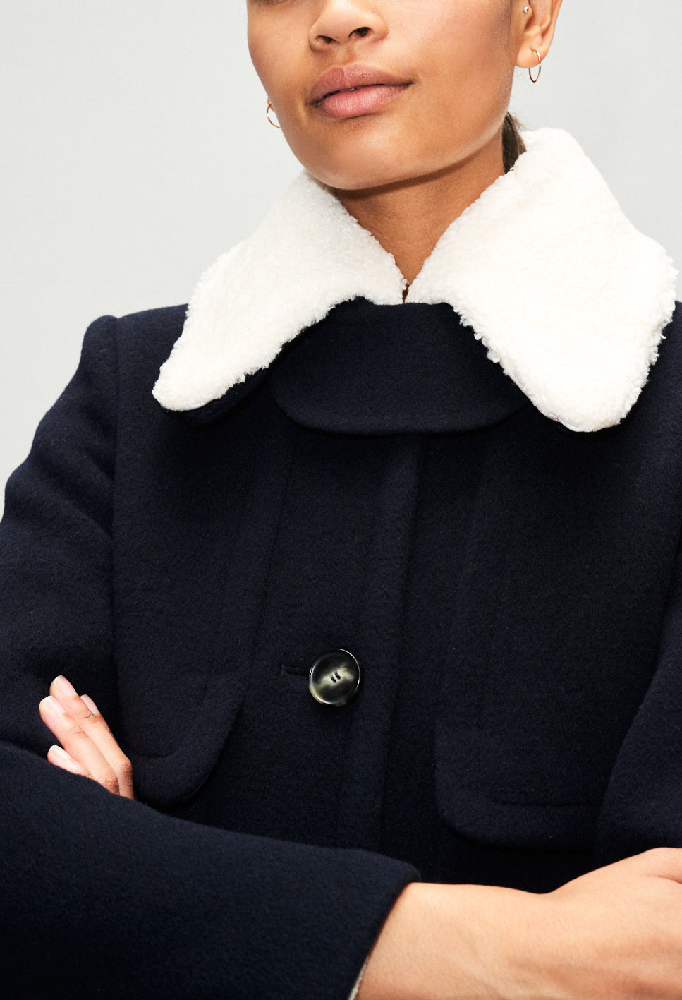 Manteau droit à col en fausse fourrure Faume - seconde main