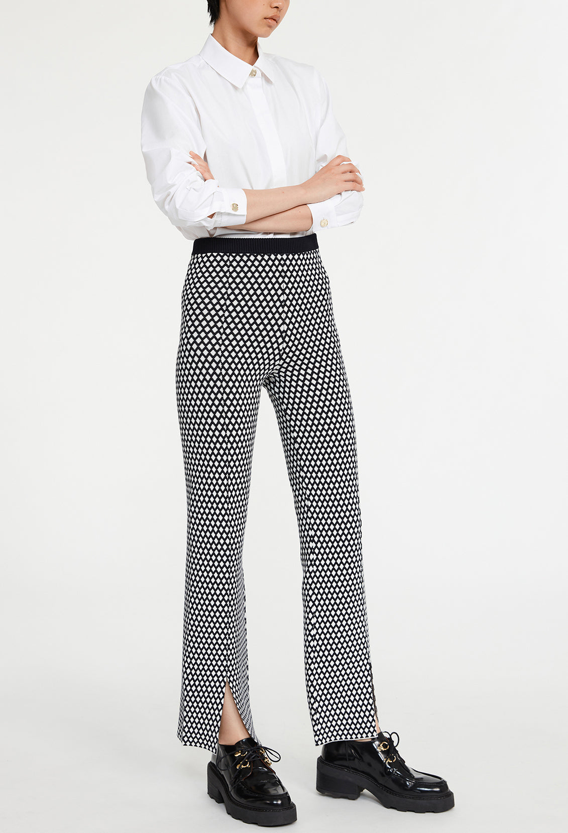 Pantalon maille à motifs graphiques Faume - seconde main