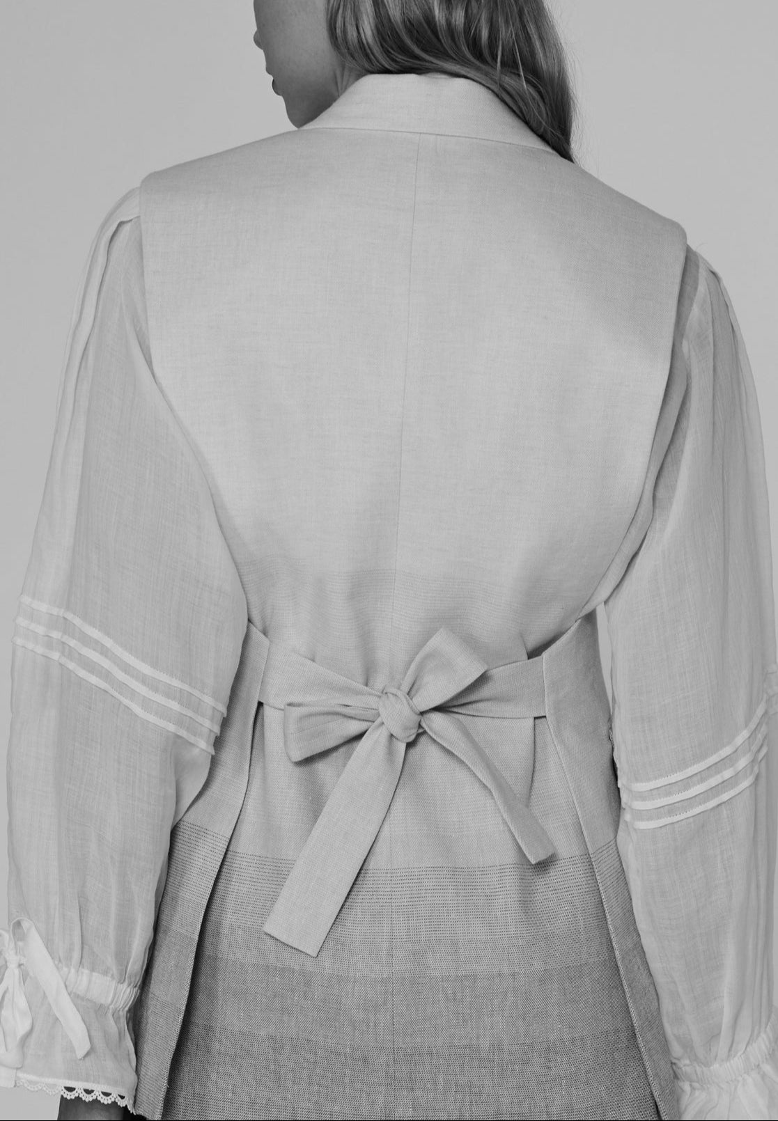 Veste bicolore tailleur sans manche Faume - seconde main