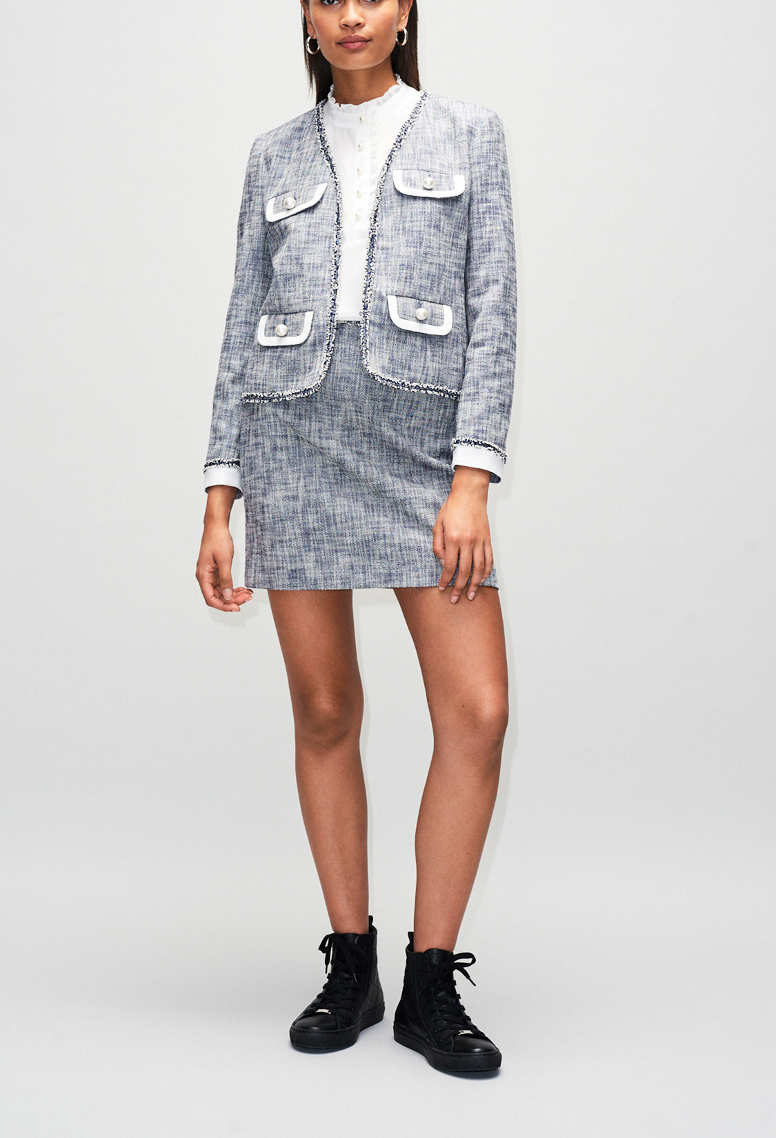 Jupe courte en tweed léger Faume - seconde main