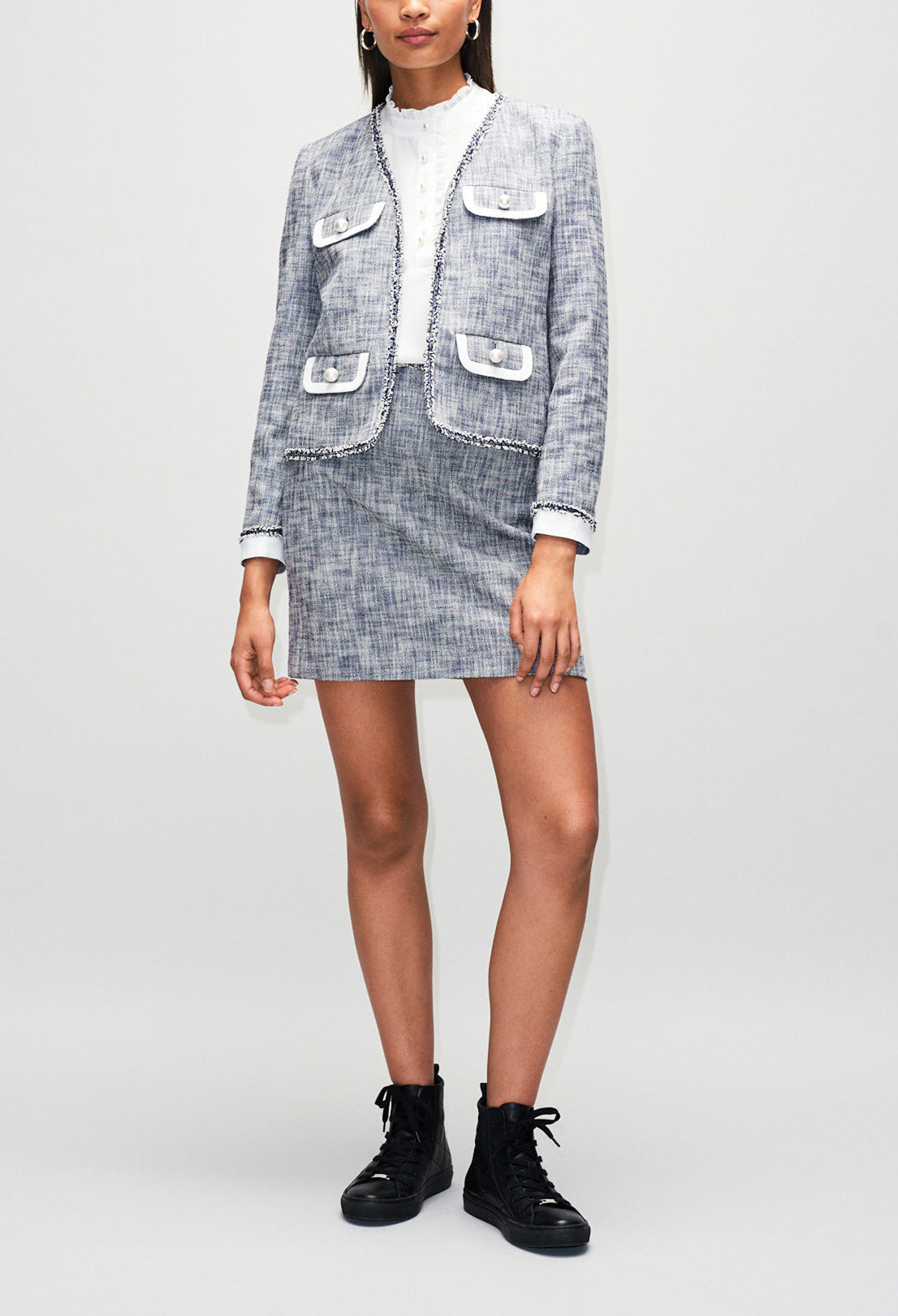 Jupe courte en tweed léger Faume - seconde main