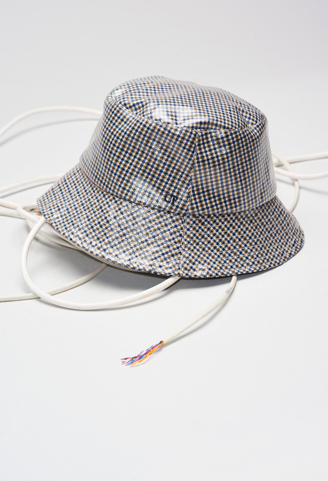 Chapeau de pluie à carreaux Faume - seconde main