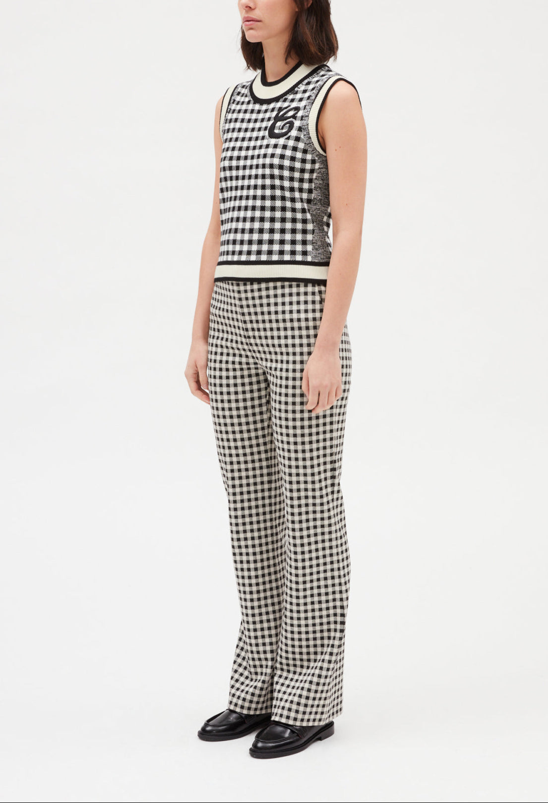 Pull sans manches carreaux bicolore Faume - seconde main