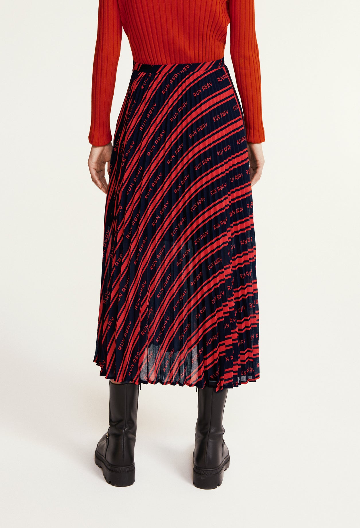 Jupe mi-longue plissée Faume - seconde main