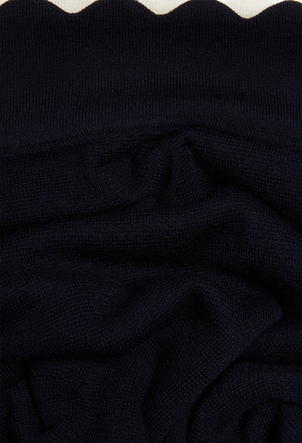 Jupe en maille en laine traçable Faume - seconde main