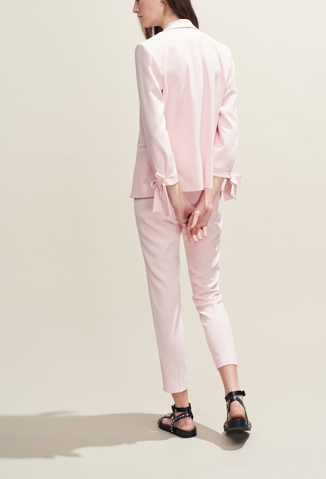 Veste tailleur rose pâle détails nœuds Faume - seconde main