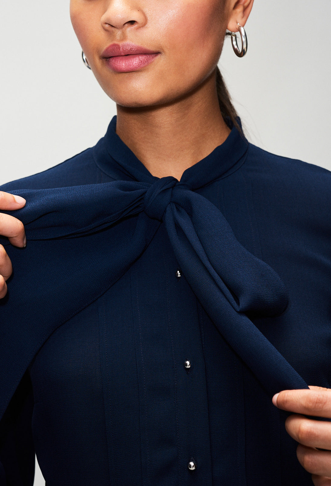 Rob longu plissé à col lavallièr Faume - seconde main