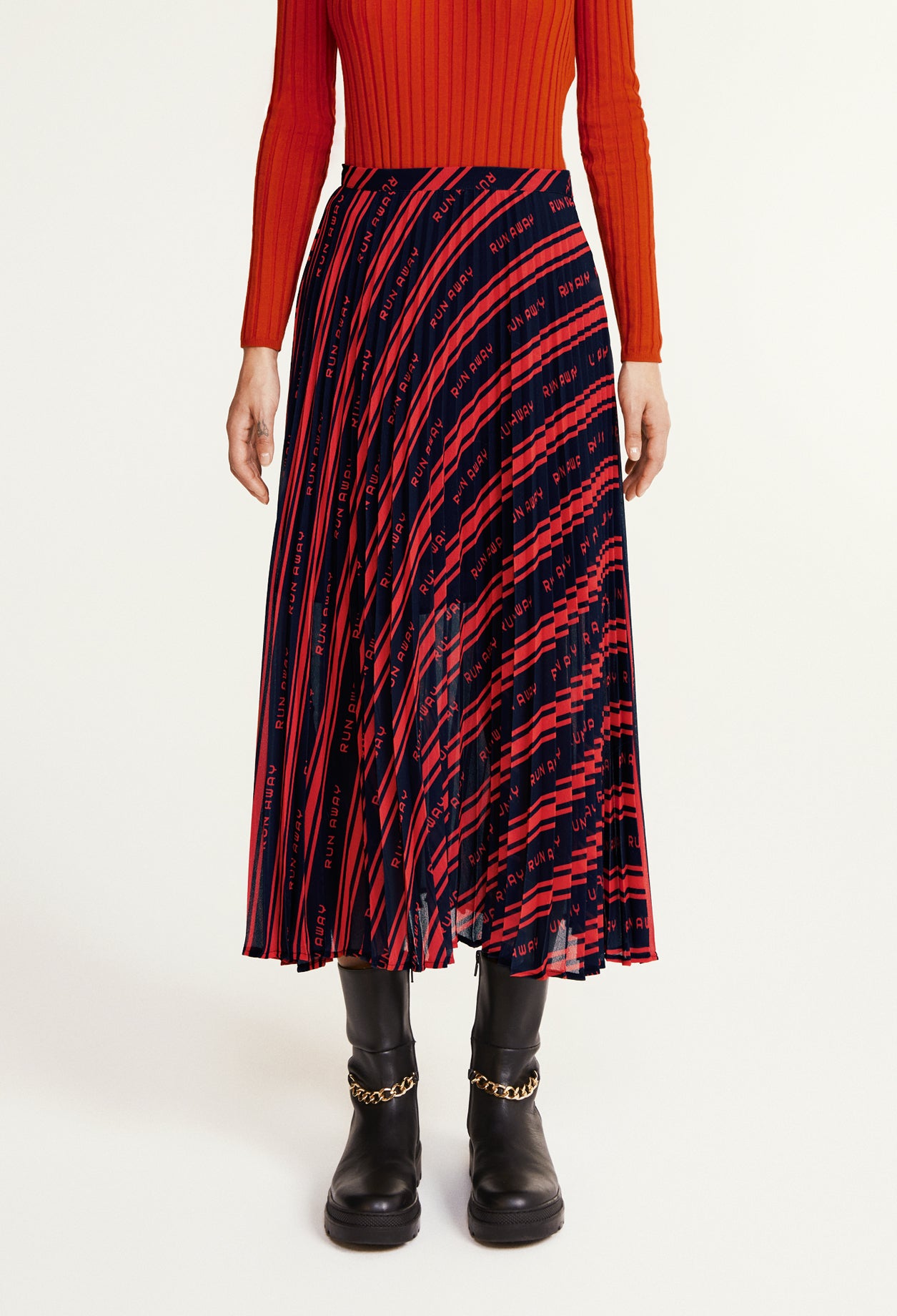 Jupe mi-longue plissée Faume - seconde main