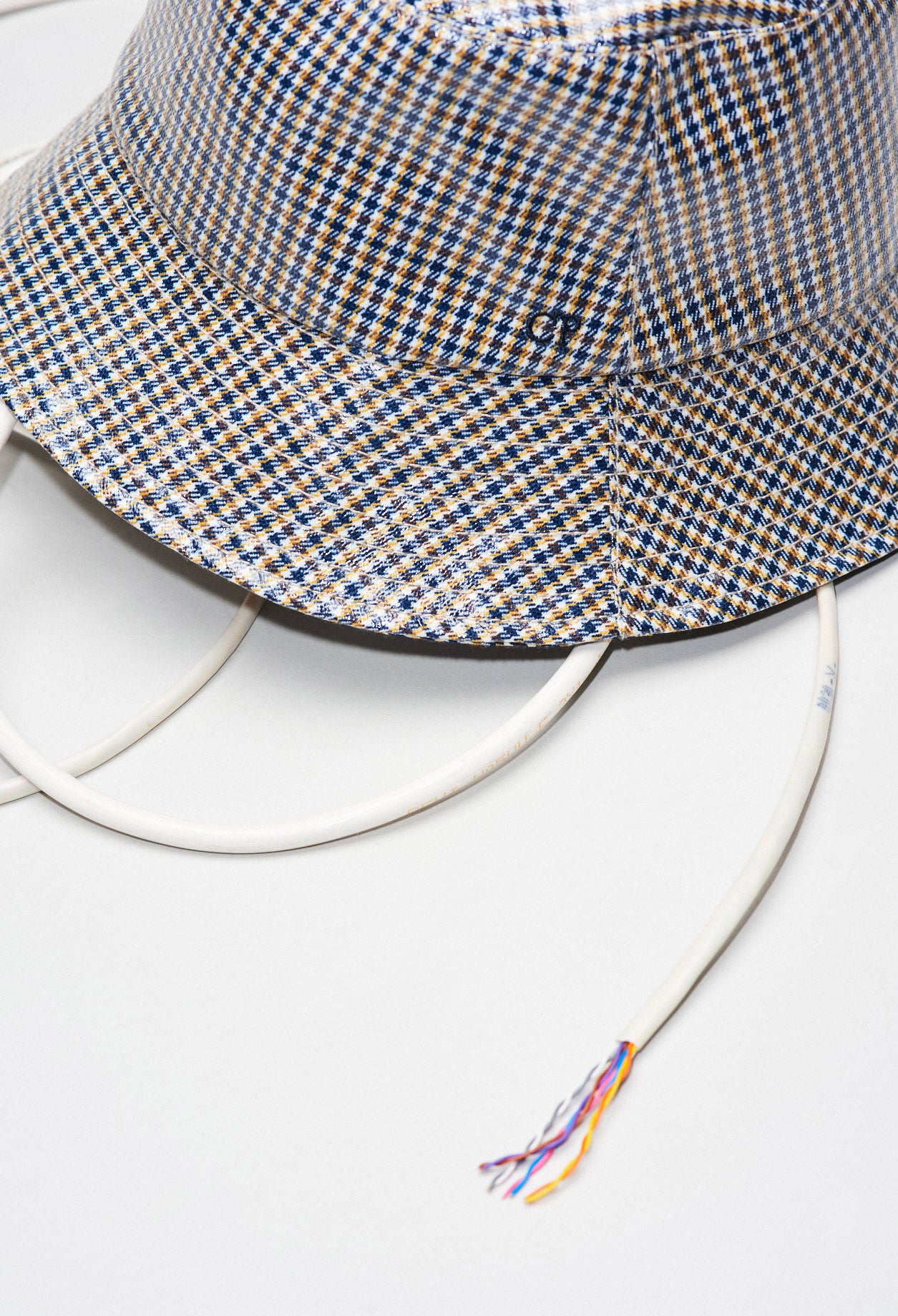 Chapeau de pluie à carreaux Faume - seconde main