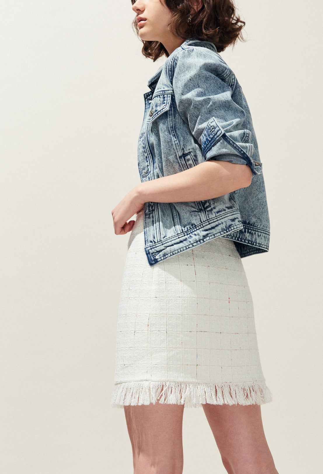 Jupe courte en tweed à franges Faume - seconde main