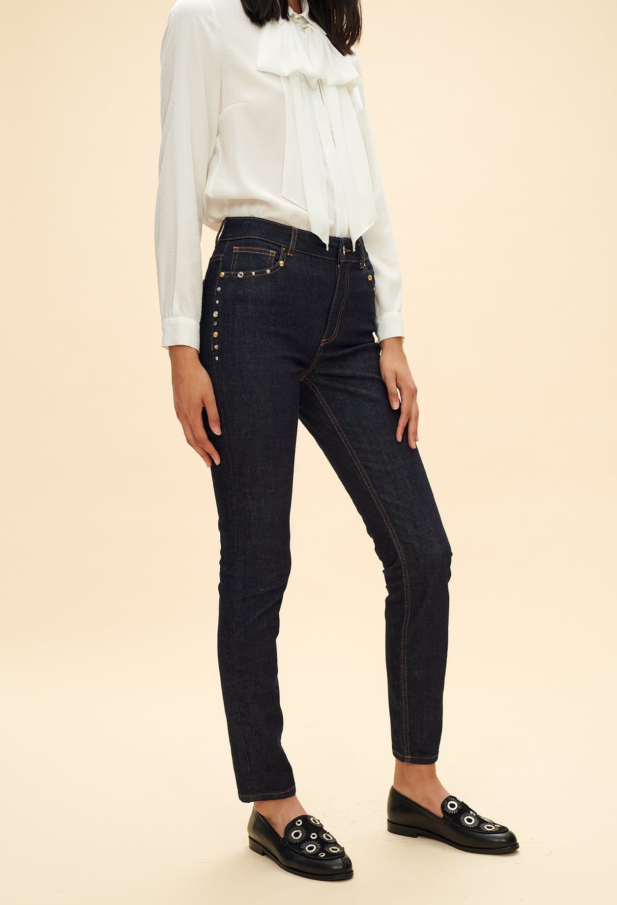 Jean slim brut détails studs Faume - seconde main